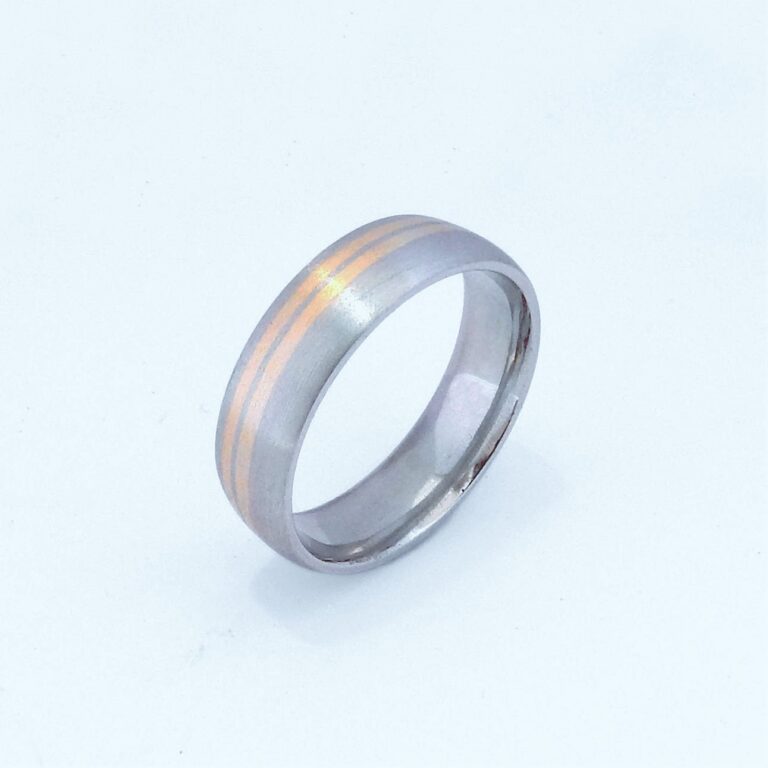 Handmade in palladium and 18ct yellow